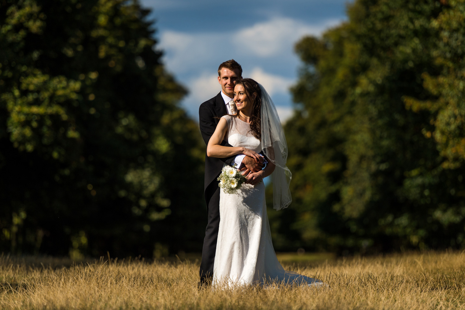 portrait of bride and groom in park